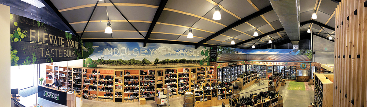 Clever use of internal "wallpaper" style graphics create interesting retail spaces for Hamilton Beer & Wine Co. - designed, printed and applied by Admark